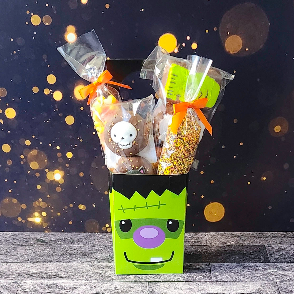 Frankenstein Monster Halloween Door Hanger.  Inside, you'll find chocolate-covered Oreos, classic candy corn, delicious milk chocolate nonpareils, and chocolate-dipped Halloween Peeps!