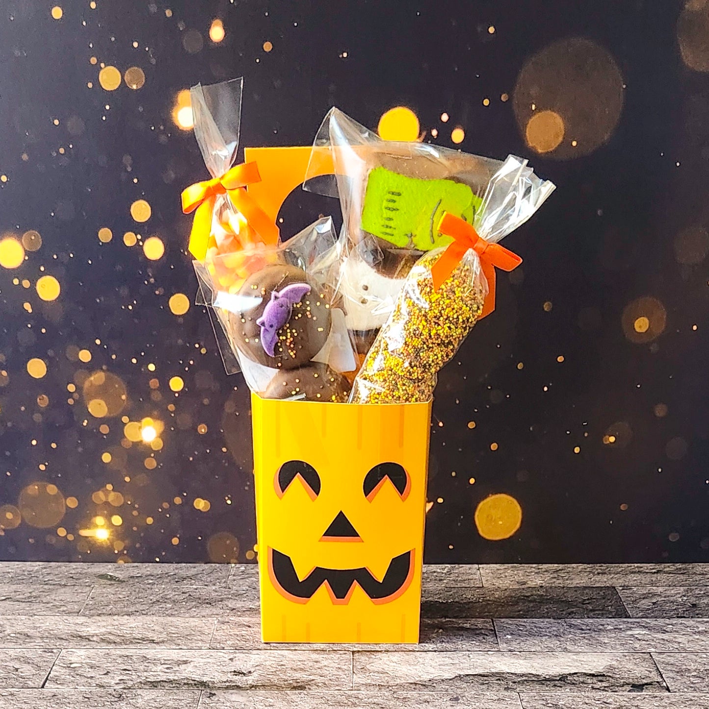 Pumpkin Halloween Door Hanger.  Inside, you'll find chocolate-covered Oreos, classic candy corn, delicious milk chocolate nonpareils, and chocolate-dipped Halloween Peeps!