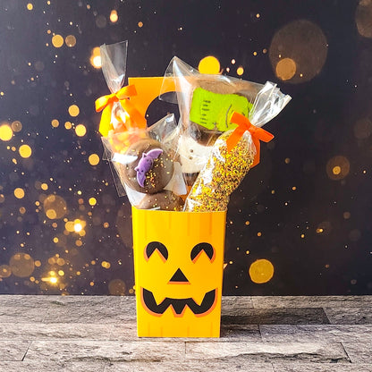 Pumpkin Halloween Door Hanger.  Inside, you'll find chocolate-covered Oreos, classic candy corn, delicious milk chocolate nonpareils, and chocolate-dipped Halloween Peeps!