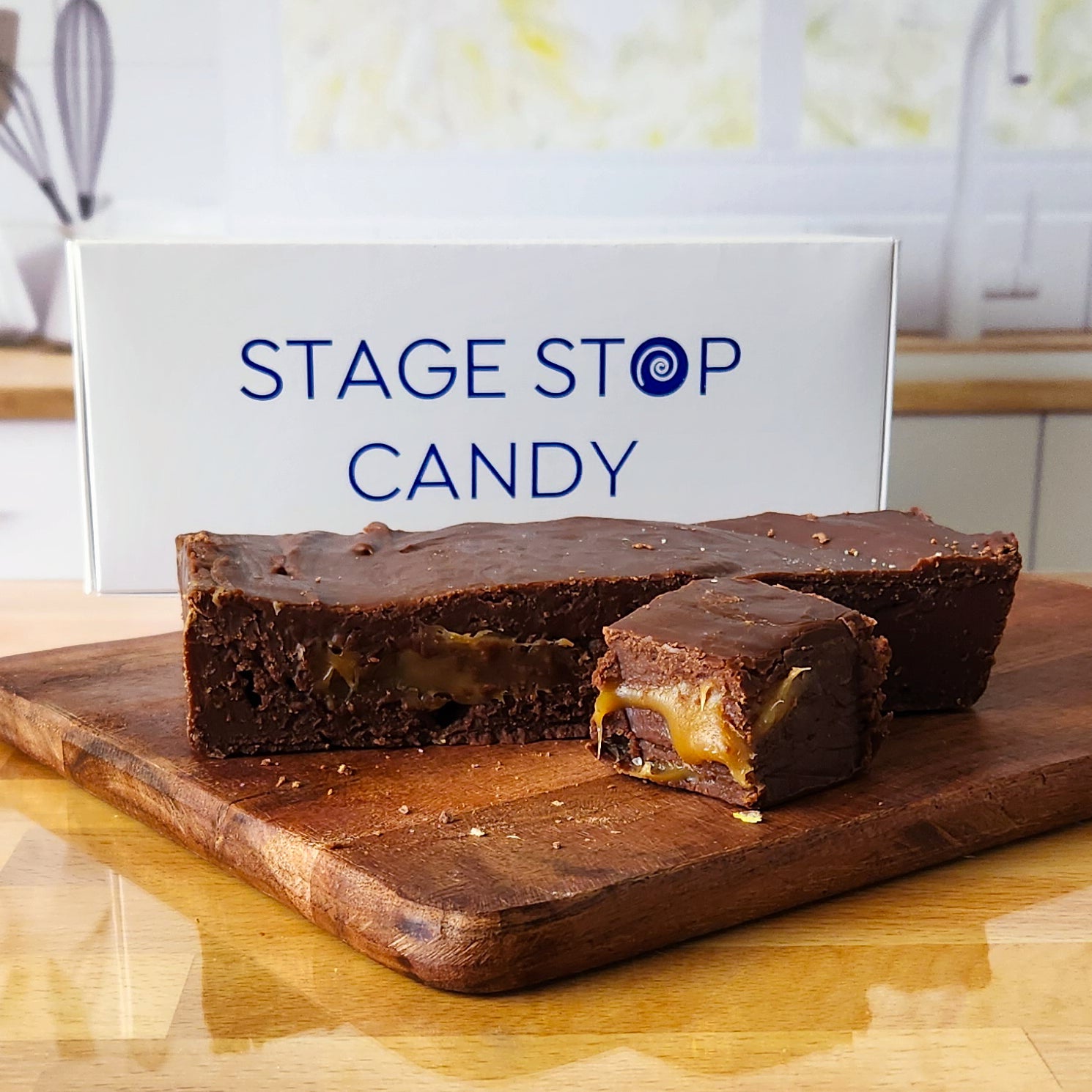 Experience the delicious taste of our Chocolate Caramel Fudge, handcrafted onsite with the freshest ingredients.  Made in a traditional copper kettle, this gourmet treat features a rich chocolate fudge base swirled with soft, gooey caramel for a delectable combination of flavors.