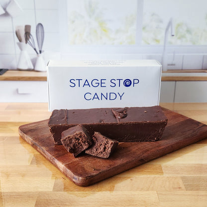 Indulge in the rich, creamy delight of Stage Stop Candy's Handcrafted Chocolate Fudge, made with a perfected family recipe right here in Dennis Port. Each piece is crafted by hand using the finest ingredients, ensuring a smooth, velvety texture that melts in your mouth. Perfect for gifting or treating yourself, our chocolate fudge offers a nostalgic taste of Cape Cod's sweet traditions.