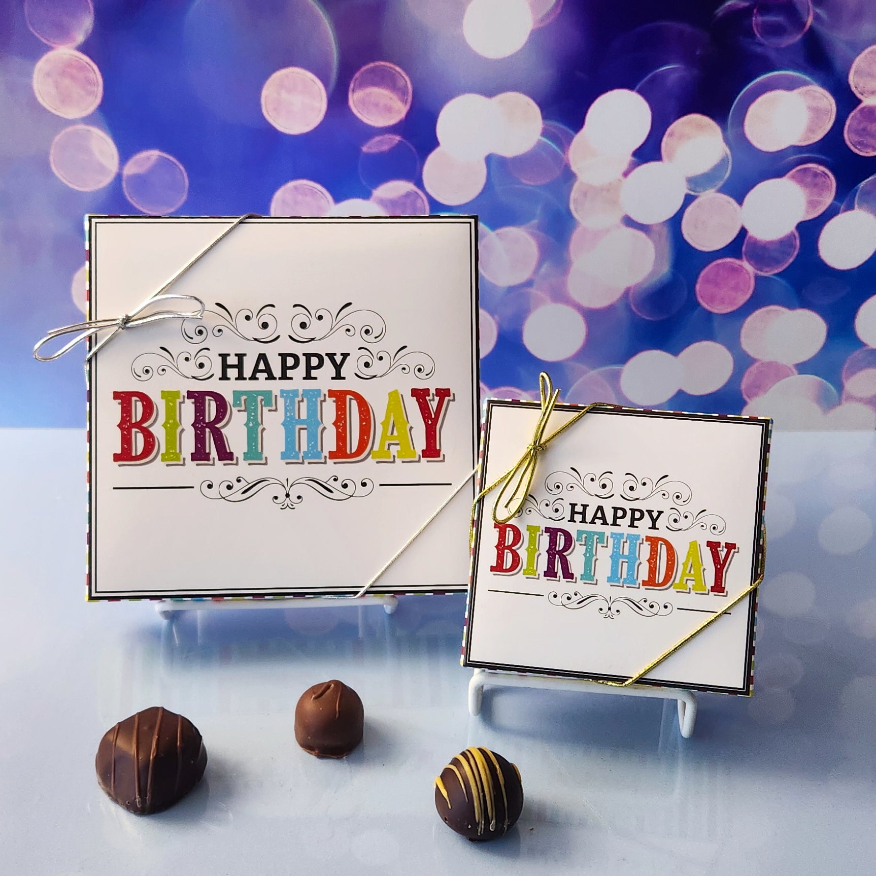 An assortment of our most popular milk and dark chocolate creams, caramels, melt-aways, and truffles all packed inside a festive box. The cover is printed with Happy Birthday in bold colors.