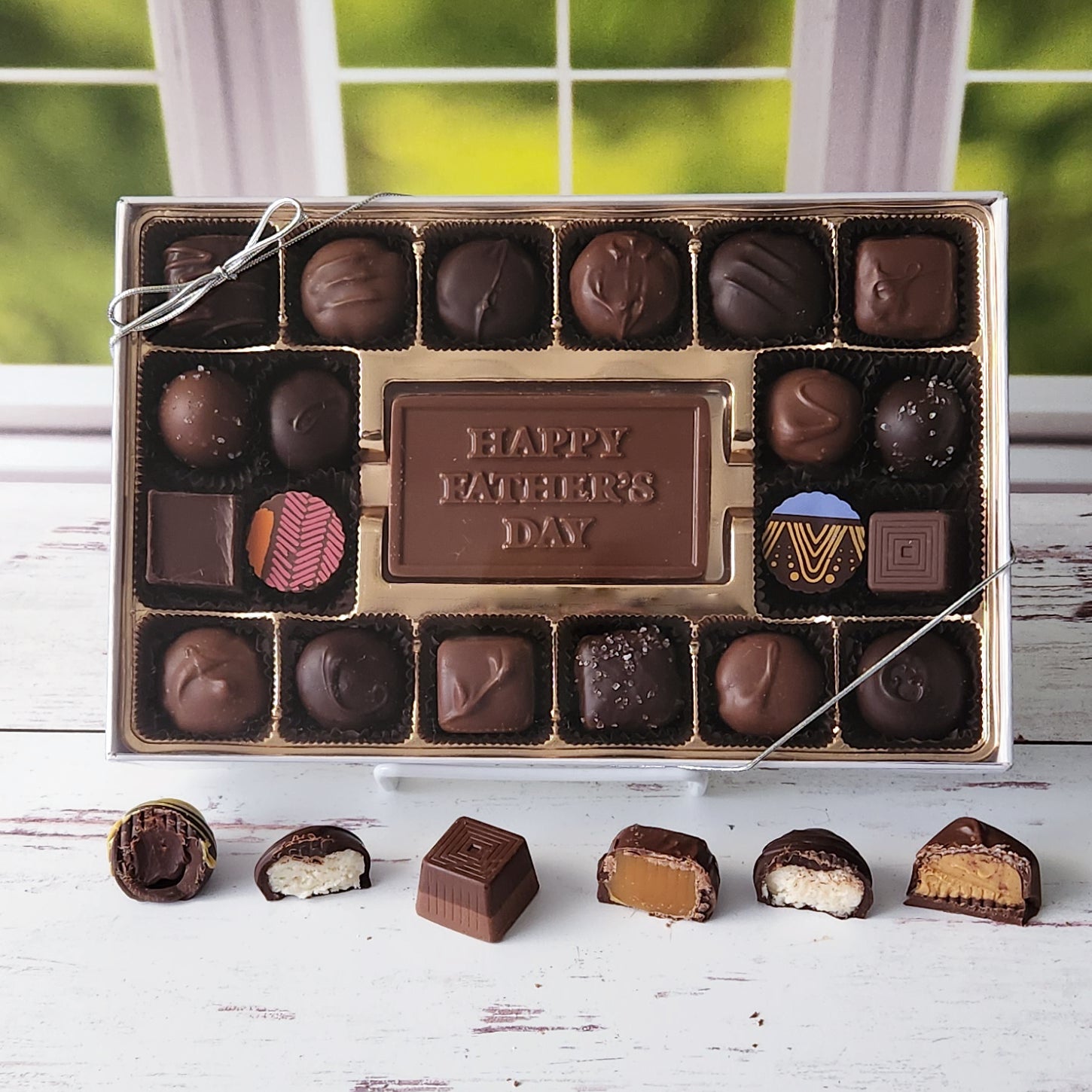 Tell Dad how much you love him with a milk and dark chocolate assortment of creams, caramels, meltaways and truffles.