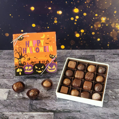 This Happy Halloween Assortment is available in 9-piece or 16-piece boxes, featuring a mix of milk and dark chocolate truffles, creams, caramels, and meltaways.