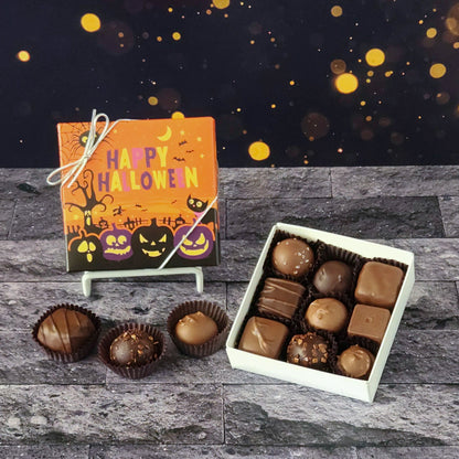This Happy Halloween Assortment is available in 9-piece or 16-piece boxes, featuring a mix of milk and dark chocolate truffles, creams, caramels, and meltaways.