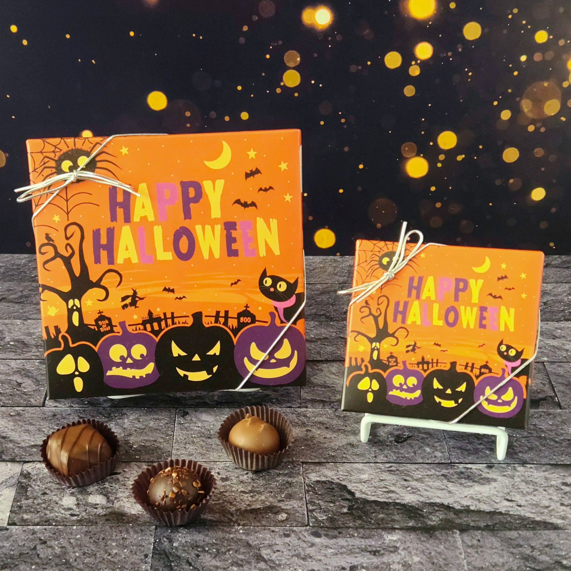 This Happy Halloween Assortment is available in 9-piece or 16-piece boxes, featuring a mix of milk and dark chocolate truffles, creams, caramels, and meltaways.