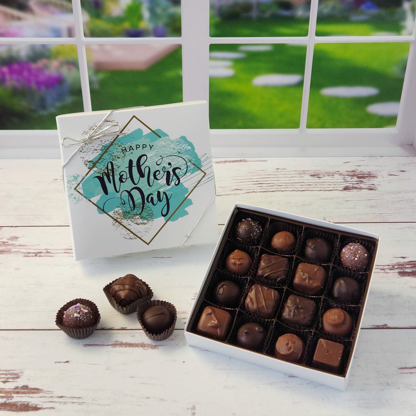 Happy Mother's Day assortment of milk and dark chocolate creams, caramels, melt‑aways and truffles.
16 piece box