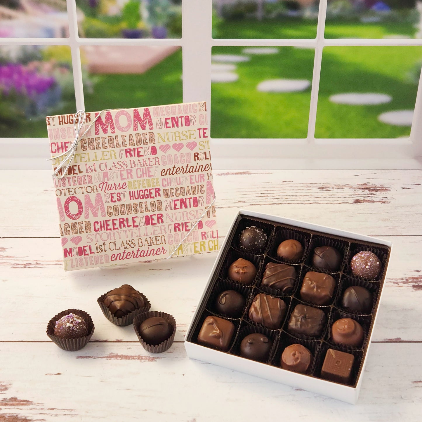 Celebrate Mom with this 16 piece assortment of milk and dark chocolate creams, caramels, melt‑aways and truffles inside a decorative box perfect for gifting.