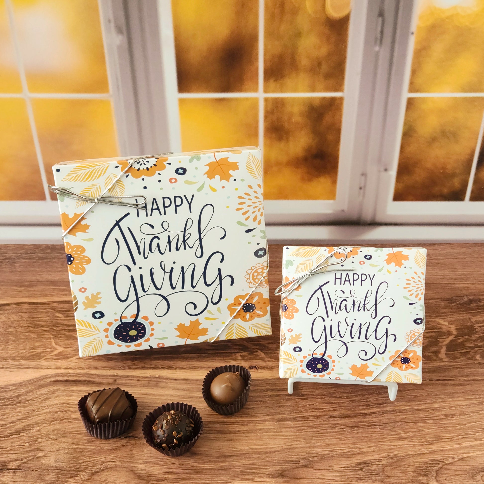 This Happy Thanksgiving Assortment Box is a collection of our popular handmade chocolates. Available in 9-piece or 16-piece boxes, this assortment features a mix of milk and dark chocolate truffles, creams, caramels, and meltaways.