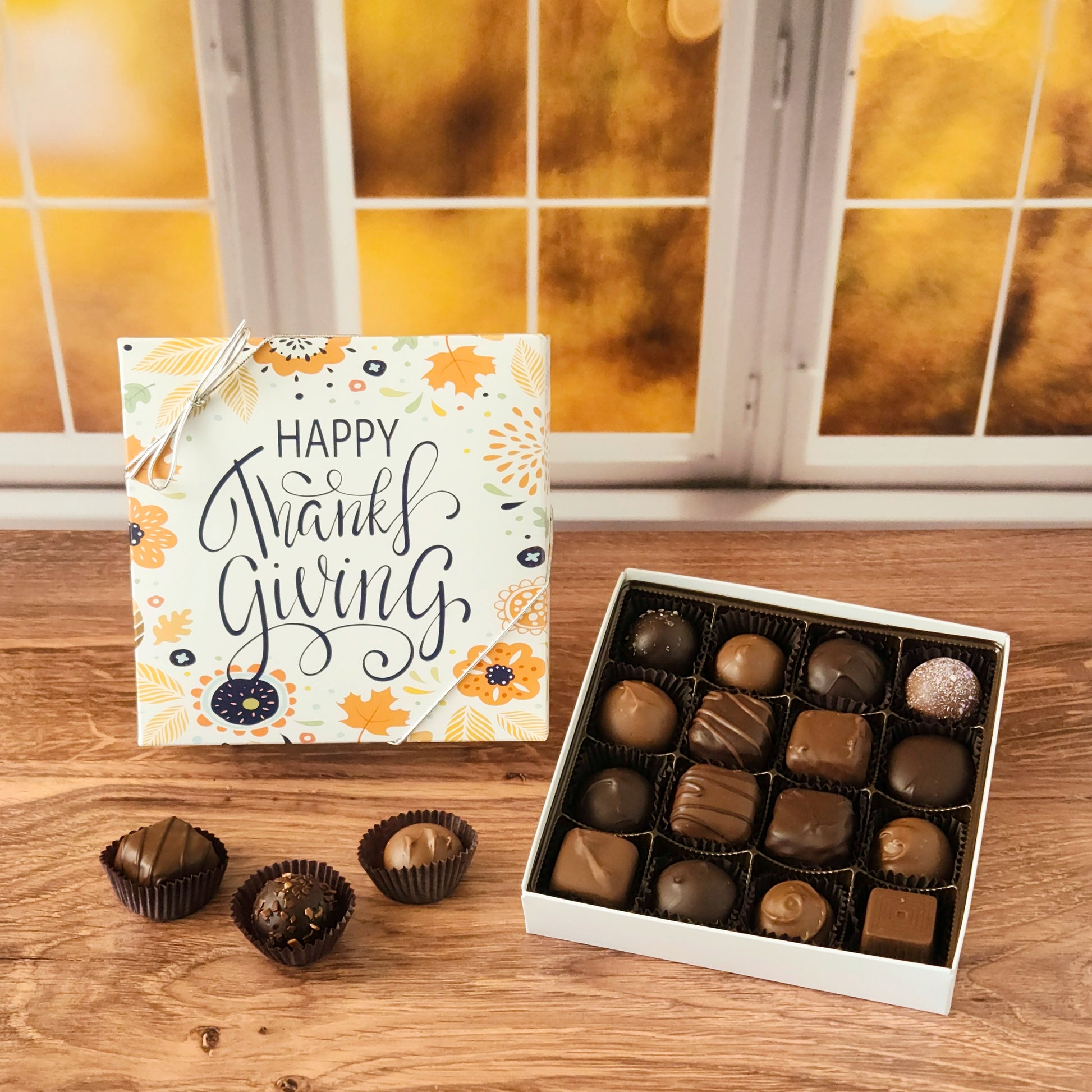 This Happy Thanksgiving Assortment Box is a collection of our popular handmade chocolates. Available in 9-piece or 16-piece boxes, this assortment features a mix of milk and dark chocolate truffles, creams, caramels, and meltaways.