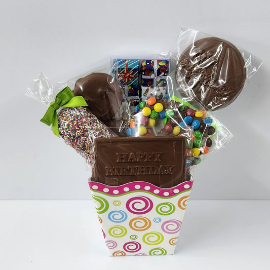 Assorted chocolates in a small Happy Birthday Gift Basket from Stage Stop Candy