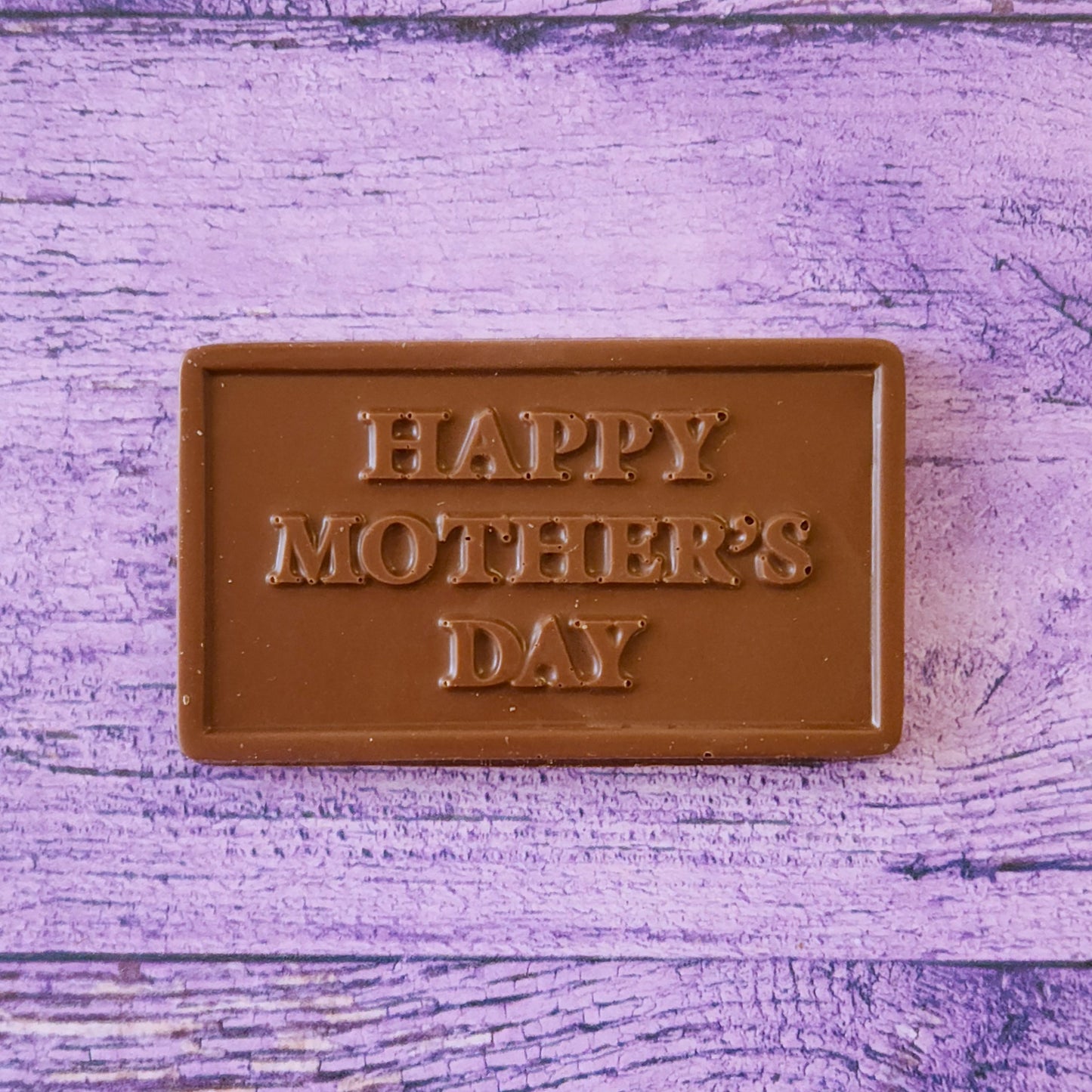 A chocolate card that says Happy Mother's Day. Makes a great gift for Mom.