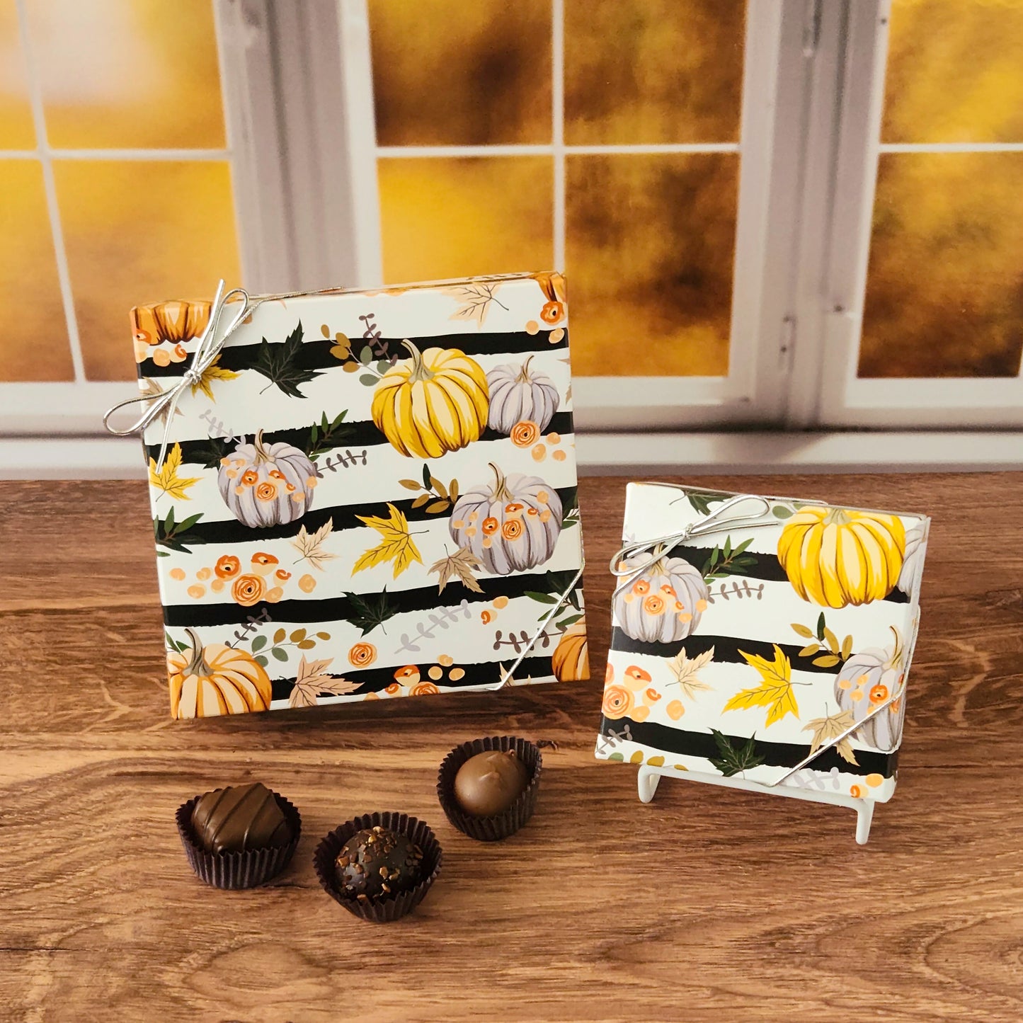 Celebrate the sweetness of the season with our Harvest Gathering Chocolate Assortment!  Available in a 9-piece or 16-piece box, this collection is filled with rich milk and dark chocolates, crafted in small batches right here in our candy kitchen.  Each bite is a surprise of flavor and texture, featuring silky creams, gooey caramels, melt-in-your-mouth meltaways, and decadent truffles that capture everything we love about fall.