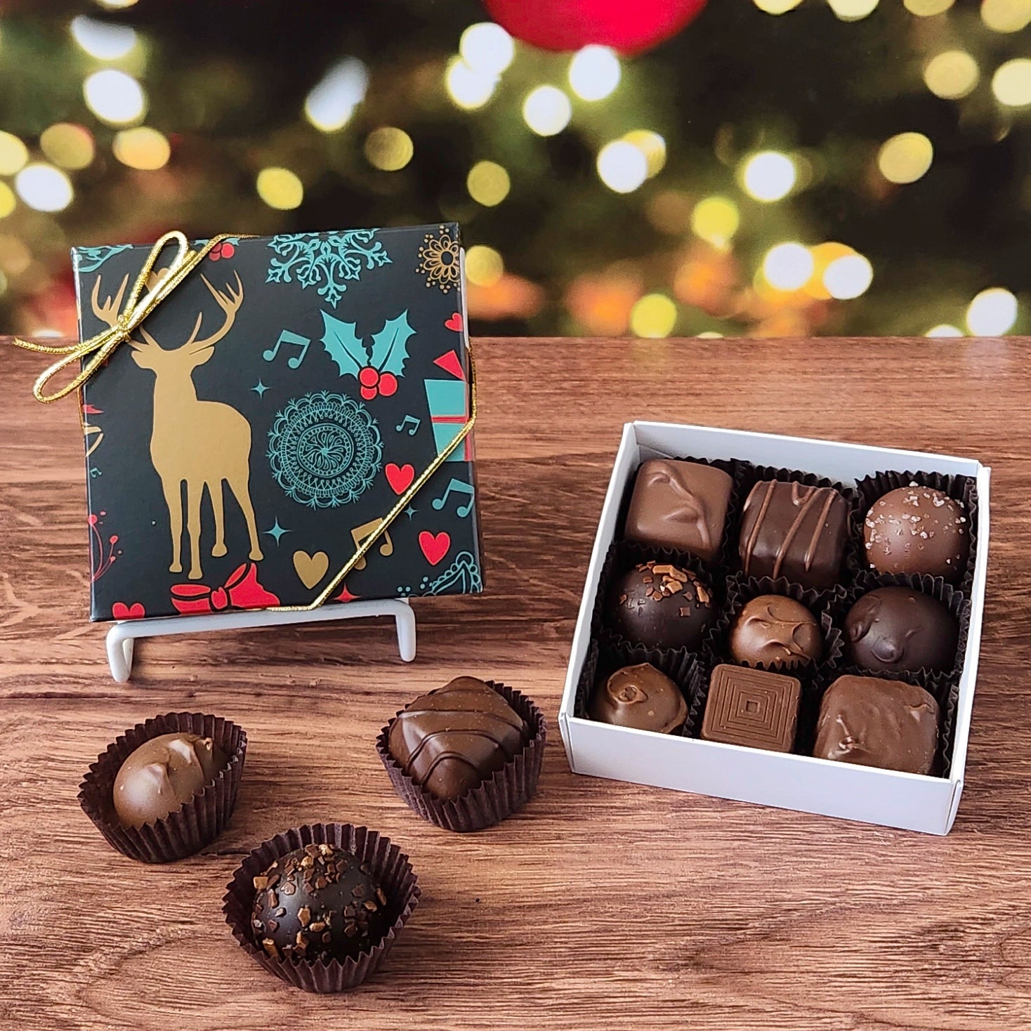 9 piece chocolate assortment in cheerful holiday themed box.  Filled with a variety of creams, caramels, melt-aways and  truffles.