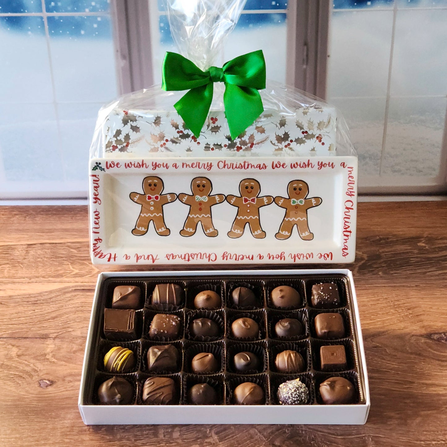 Celebrate the holiday season with our Holiday Sayings Candy Tray! Each tray features a unique holiday saying paired with a 24-piece assortment of our most popular milk and dark chocolates, including truffles, creams, meltaways, and caramels. Beautifully wrapped and bursting with flavor, this tray makes a thoughtful gift or the perfect addition to your holiday celebrations