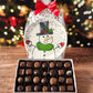 Festive snowman holiday plate with 28 piece milk and dark chocolate assortment from Stage Stop Candy in Dennisport