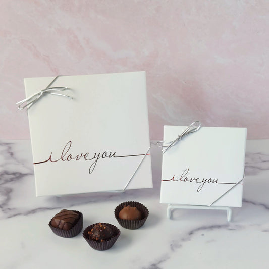 Sometimes, the best way to say “I love you” is with chocolate—and our I Love You Chocolate Box does just that. This delightful assortment Includes truffles, creams, caramels & melt-aways in milk and dark chocolates.  Available in your choice of 9 or 16 pieces, each one crafted to impress and indulge.