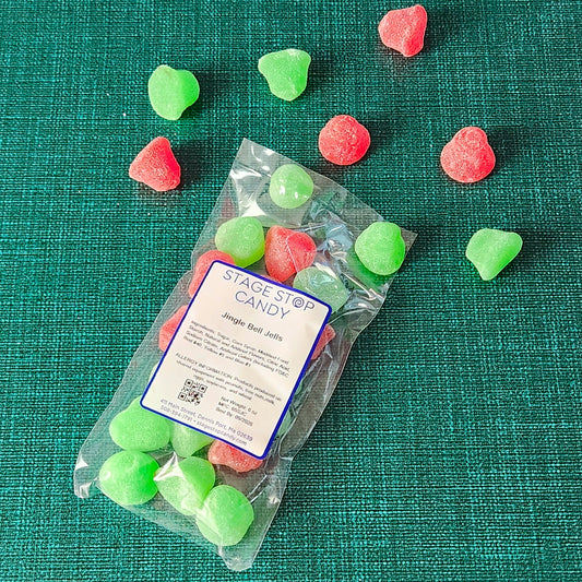 Bring holiday magic to life with Jingle Bell Jells, the ultimate Christmas candy! These festive red and green gummy bells are packed with the delightful flavors of juicy cherry and zesty lime, adding a pop of color and a burst of flavor to your celebrations. Perfectly sized for decorating gingerbread houses, filling candy dishes, or adding a unique twist to your favorite holiday cookies, these candies are as versatile as they are delicious.  Packed in 6oz bag.