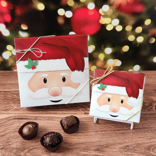 Chocolate assortment in decorative Santa Clause box.  Filled with a variety of creams, caramels, melt-aways and  truffles.
Available in 9 or 16 pieces