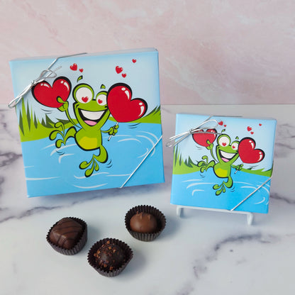 Hop into a world of chocolatey bliss with our Leaping Frog Chocolate Assortment! Bursting with rich milk and dark chocolate favorites, this festive 9-piece or 16-piece box is perfect for anyone who loves a little whimsy with their sweets.
Inside, you'll discover a delicious variety of handmade favorites: silky meltaways, buttery caramels, rich truffles, and smooth, dreamy creams.