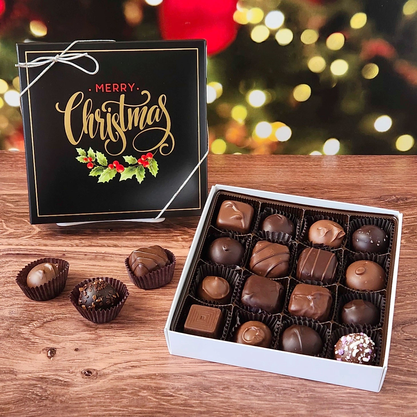 16 Piece chocolate assortment in Merry Christmas decorative box.  filled with a variety of creams, caramels, melt-aways and  truffles.