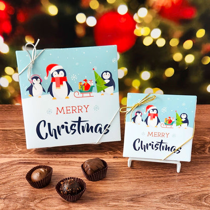Merry Christmas Penguins Chocolate Assortment filled with a variety of creams, caramels, melt-aways and  truffles.
Available in your choice of either 9 piece or 16 piece boxes