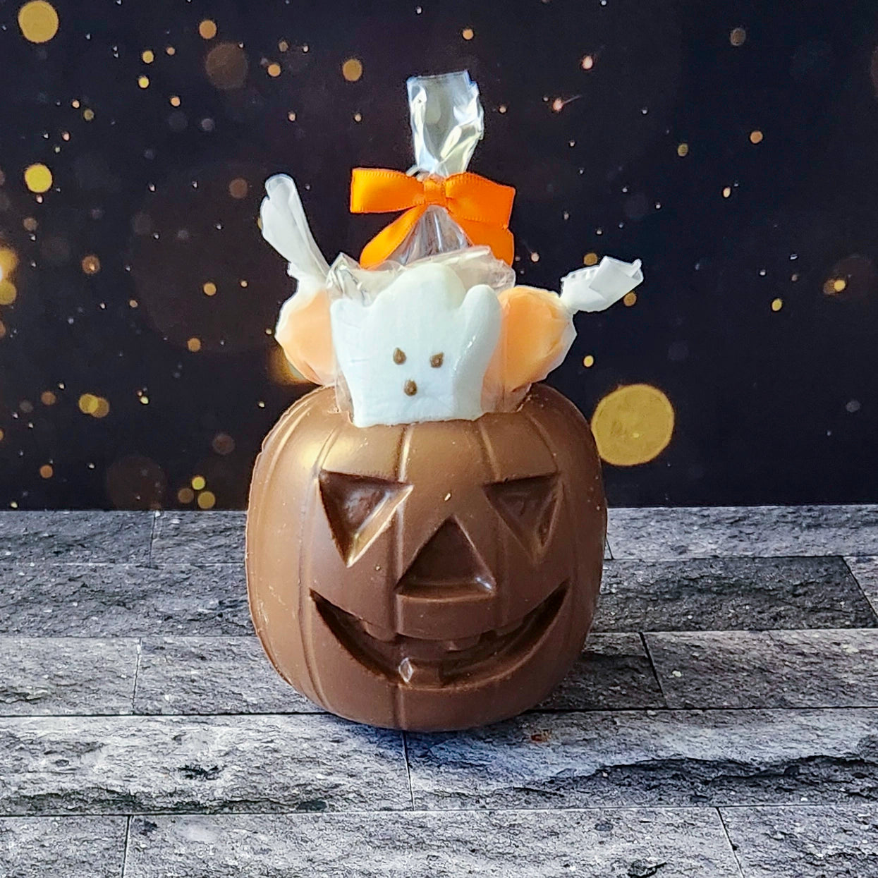 Get ready for fall fun with our Chocolate 3D Pumpkin, crafted from our delicious milk chocolate and filled with a festive assortment of treats! Inside this hollow pumpkin, you’ll discover Orange Taffy, Candy Corn, and a Ghost Peep.  Perfect for celebrating the season with a combination of sweet surprises.
Due to its delicate nature, this item is only available for in-store pick-up.