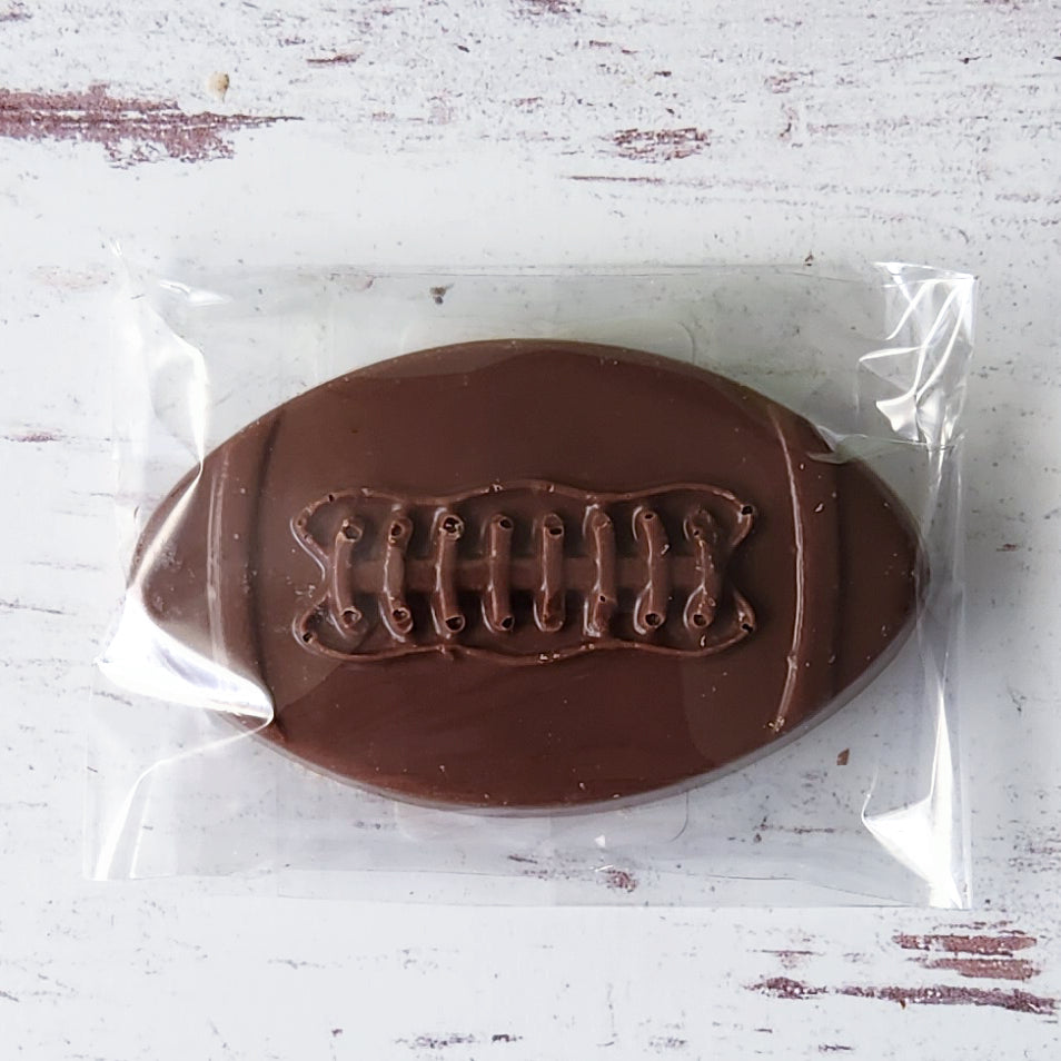 Chocolate in the shape of a football. Perfect for team gifts, coach gifts or any sports fan.