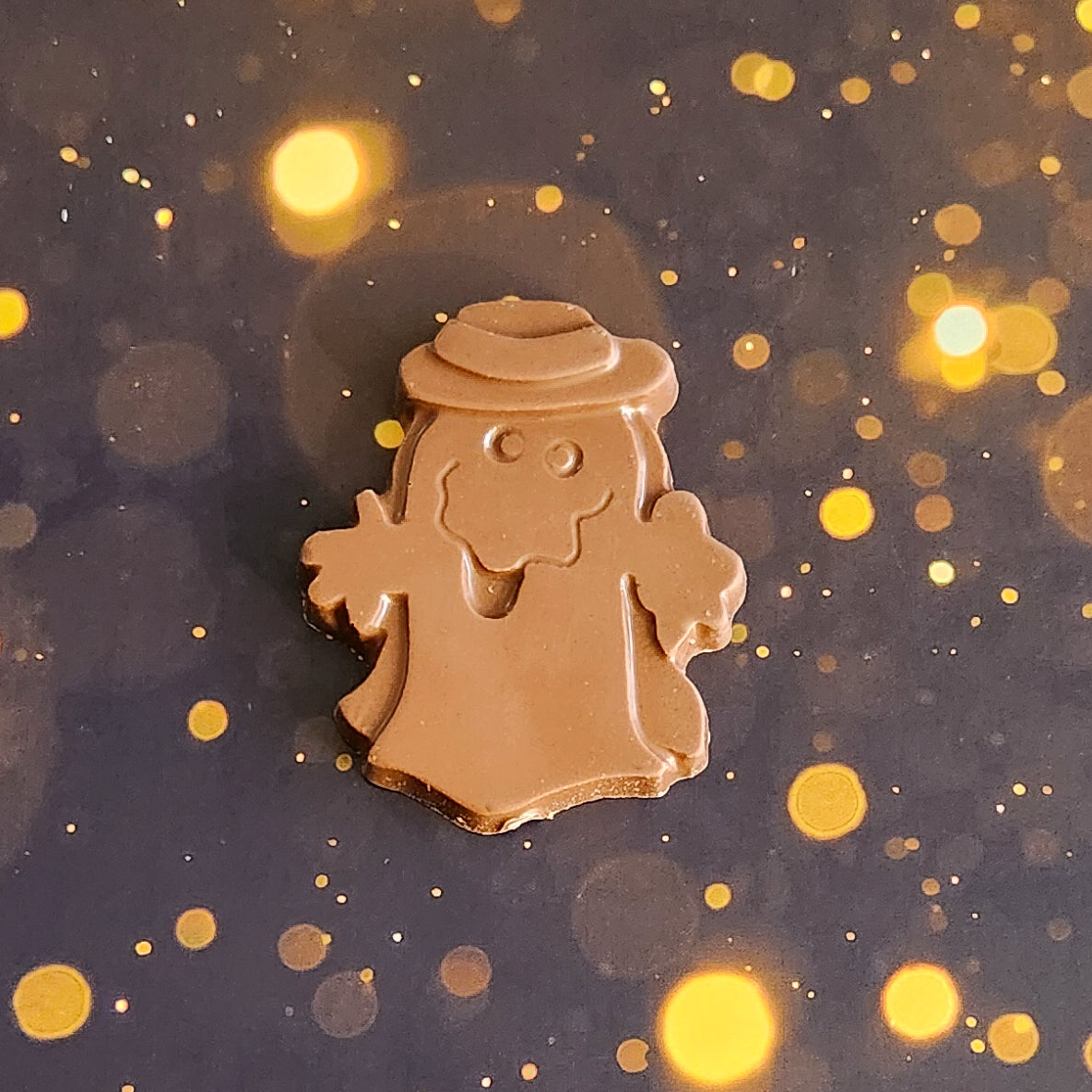 Milk Chocolate Ghost with hat Favor.  Measuring approximately 2.75 inches wide by 3.25 inches tall.