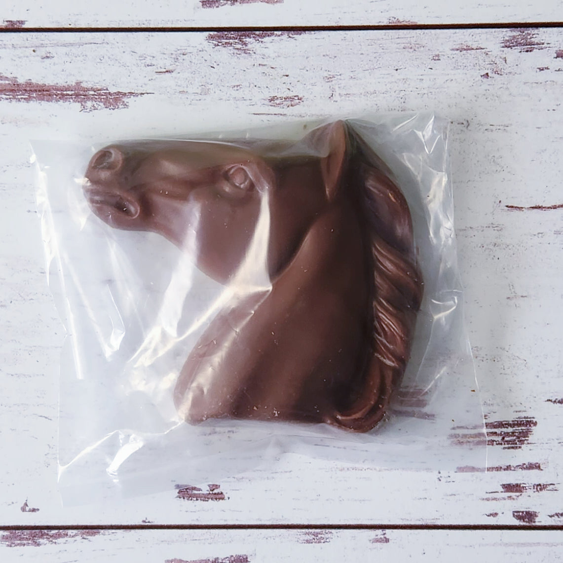 delicious milk chocolate in the shape of a horse head. Perfect for party favors.