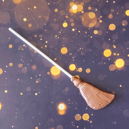 Unleash your inner wizard with our Chocolate Nimbus! Shaped like a broomstick, this delicious milk chocolate lollipop is perfect for fans of all things magical.