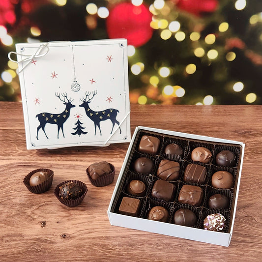 16 Piece Winter Reindeer Chocolate Assortment filled with a variety of creams, caramels, melt-aways and  truffles.