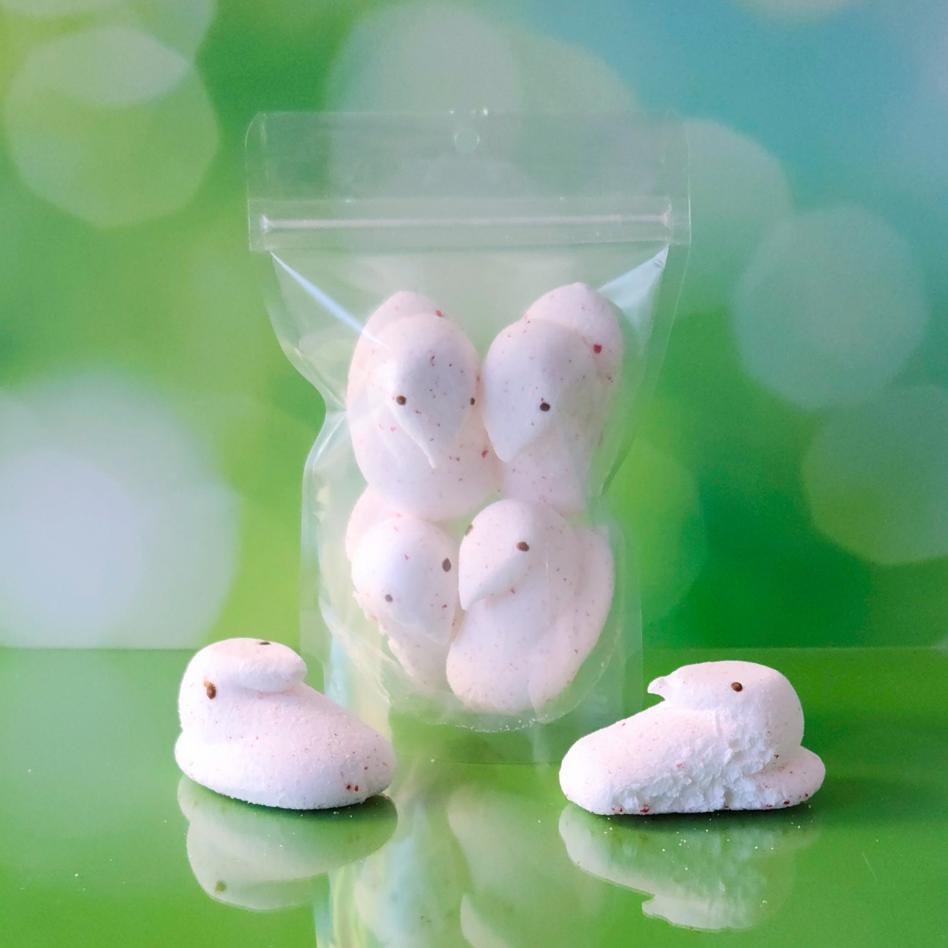 Treat yourself to a cool, crispy holiday snack with our Freeze Dried Peppermint Pufflings! These peppermint-flavored Peep chicks are transformed through freeze-drying, creating a delightfully light and crunchy texture while intensifying their minty sweetness. Each bag comes with four festive Pufflings, perfect for snacking, gifting, or adding a unique twist to your holiday celebrations.