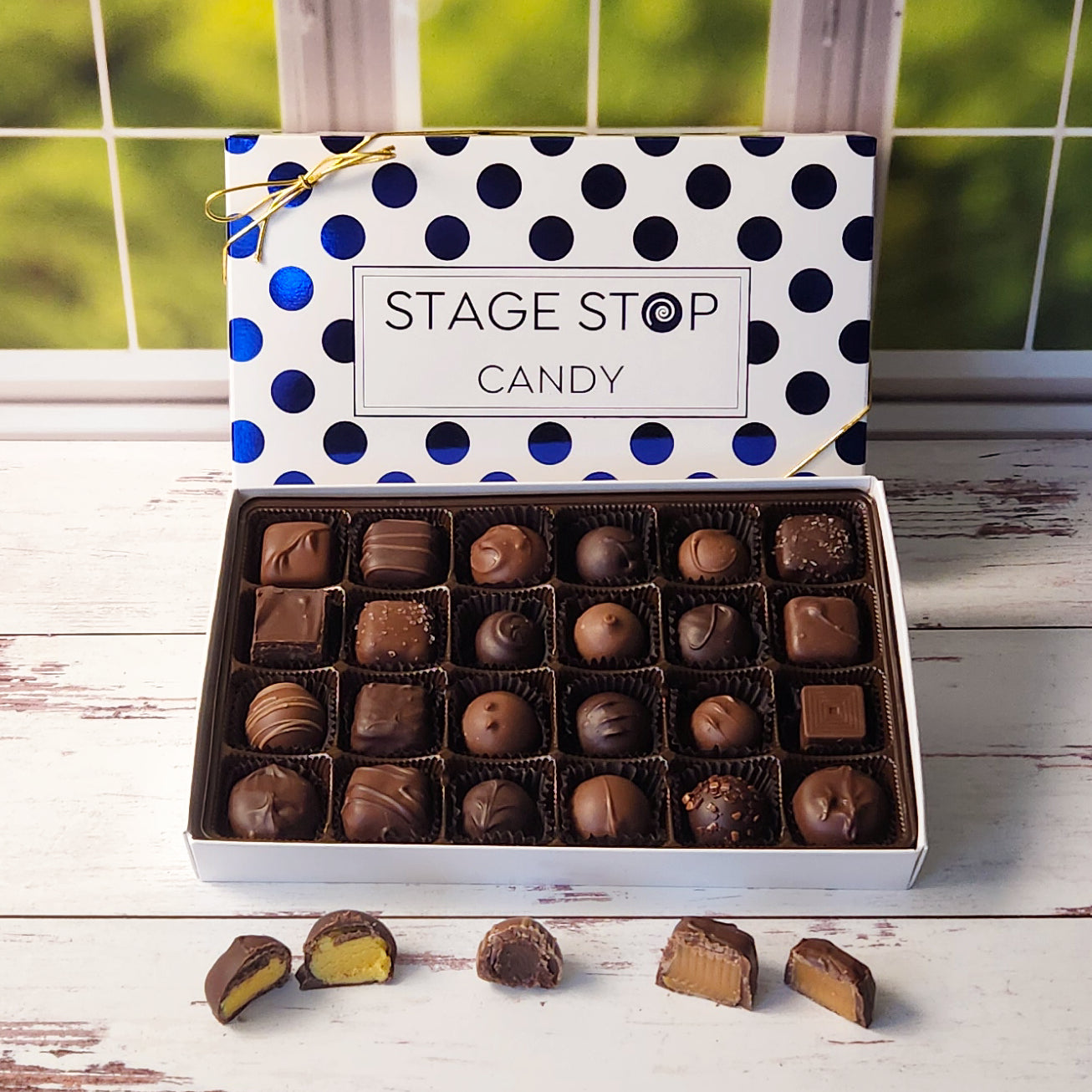 24 pieces of our most popular chocolate candies. This medium size box is perfect for sharing. Each Cream, Caramel, Truffle or meltaway is dipped in either Milk Chocolate or Dark Chocolate.