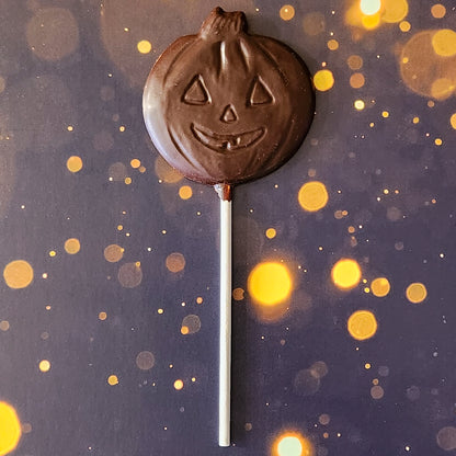 Dark Chocolate Jack-o-lantern lollipop.  Each handcrafted pumpkin face measures approximately 2.75 inches wide by 2.75 inches tall (not counting the lollipop stick!)