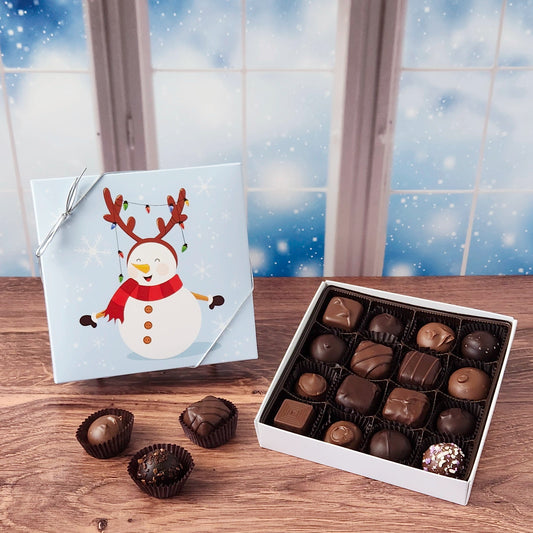 16 Piece Snowman Reindeer Chocolate Assortment filled with a variety of creams, caramels, melt-aways and  truffles.