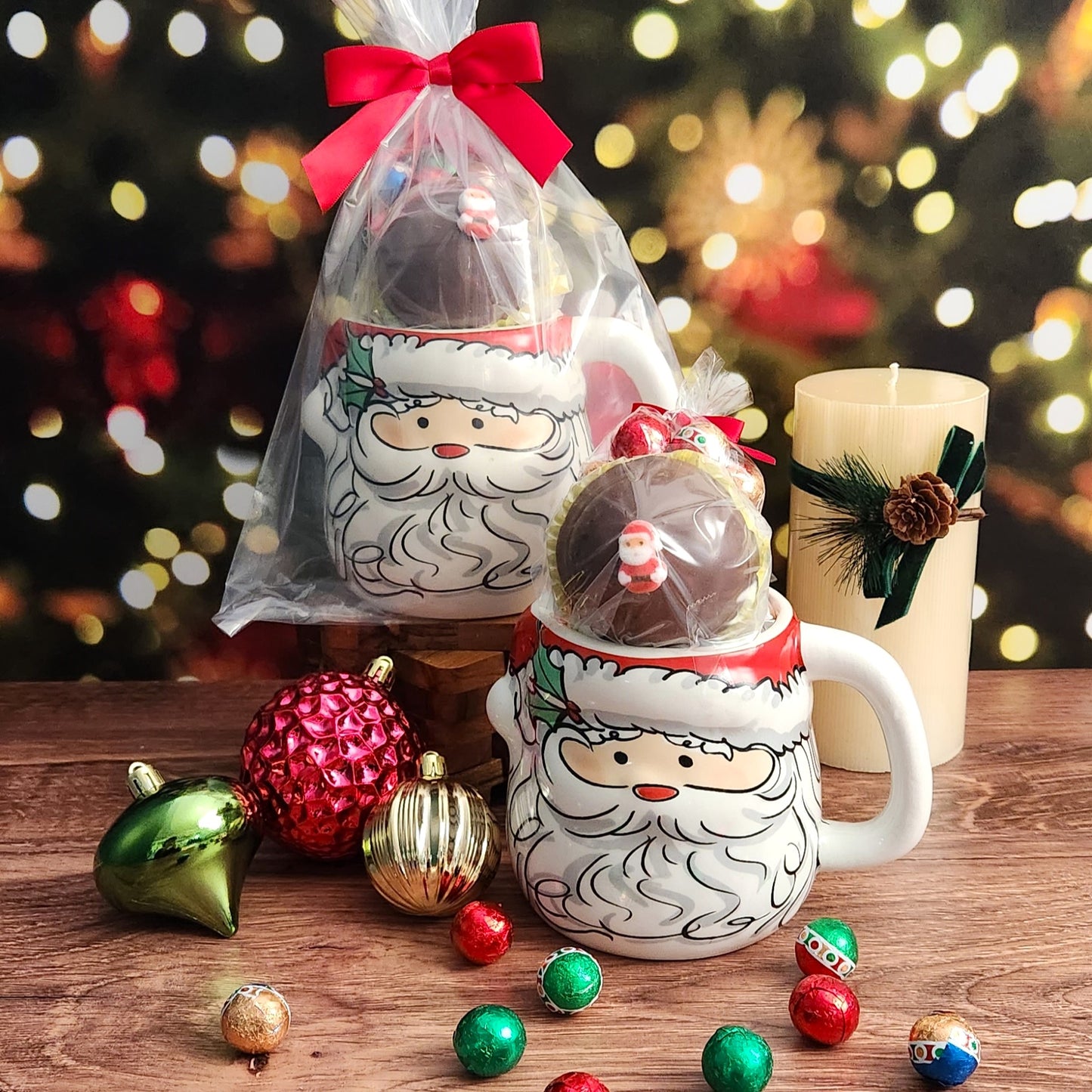 Spread season’s greetings with this cheerful ceramic Santa Face Gift mug, including a Milk Chocolate Hot Cocoa Bomb and Foiled Ornaments