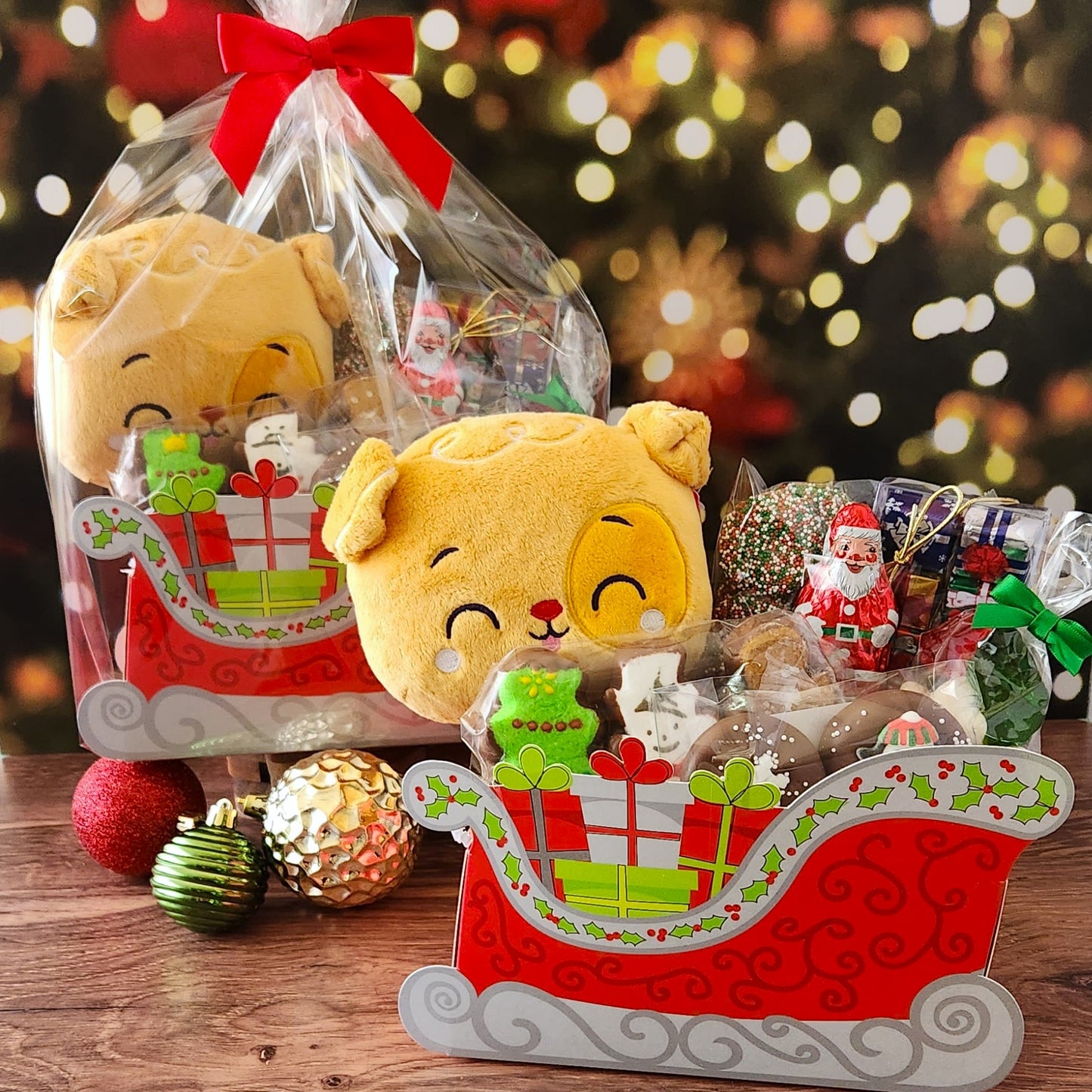 A holiday gift for everyone! Includes a cute stuffed animal and assortment of festive holiday chocolates and treats. 