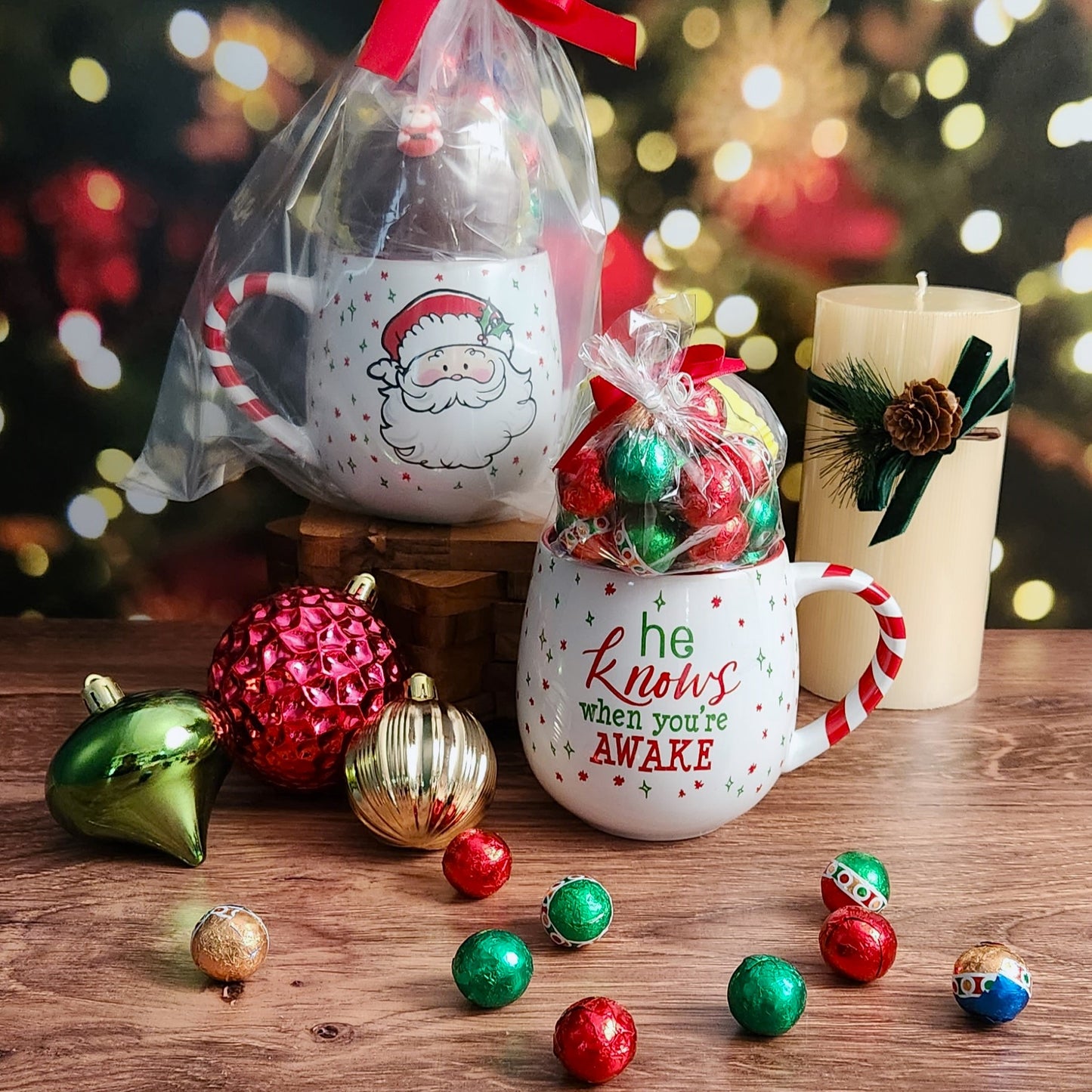 Embrace the holiday spirit with this Santa mug displaying a festive saying and indulge  in a Milk Chocolate Hot Cocoa Bomb and Milk Chocolate Foiled Ornaments