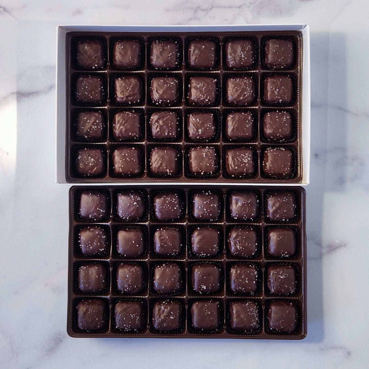 2 Layer - 48 Piece box Milk and Dark Chocolate Sea Salt Caramel Assortment.