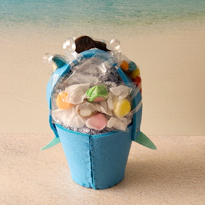 Yummy Salt Water Taffy fills the back of our Shark themed basket. Perfect for birthdays, thinking of you or any other fun celebration.