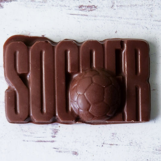 Milk Chocolate Soccer Favor. The word Soccer is spelled out with a soccer ball in front. Perfect for team gifts!