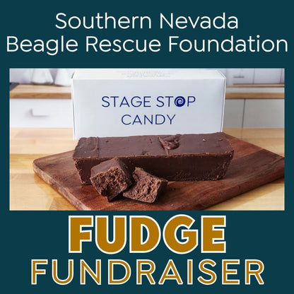 Promotional graphic for a 'Southern Nevada Beagle Rescue Foundation Fudge Fundraiser' featuring a bar of chocolate fudge and pieces on a wooden cutting board in front of a white box labeled 'STAGE STOP CANDY'. The graphic has a dark teal background with white and gold text.
