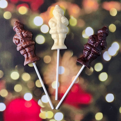 Celebrate the season with our Standing Santa Lollipop—a delightful holiday favorite crafted to resemble jolly Old Saint Nick himself! Made from premium chocolate molded into a cheerful Santa Claus, this lollipop is available in three delicious varieties: smooth Milk Chocolate, rich Dark Chocolate, and creamy White Chocolate. Perfect as a festive stocking stuffer, a thoughtful holiday gift, or a sweet treat for yourself!