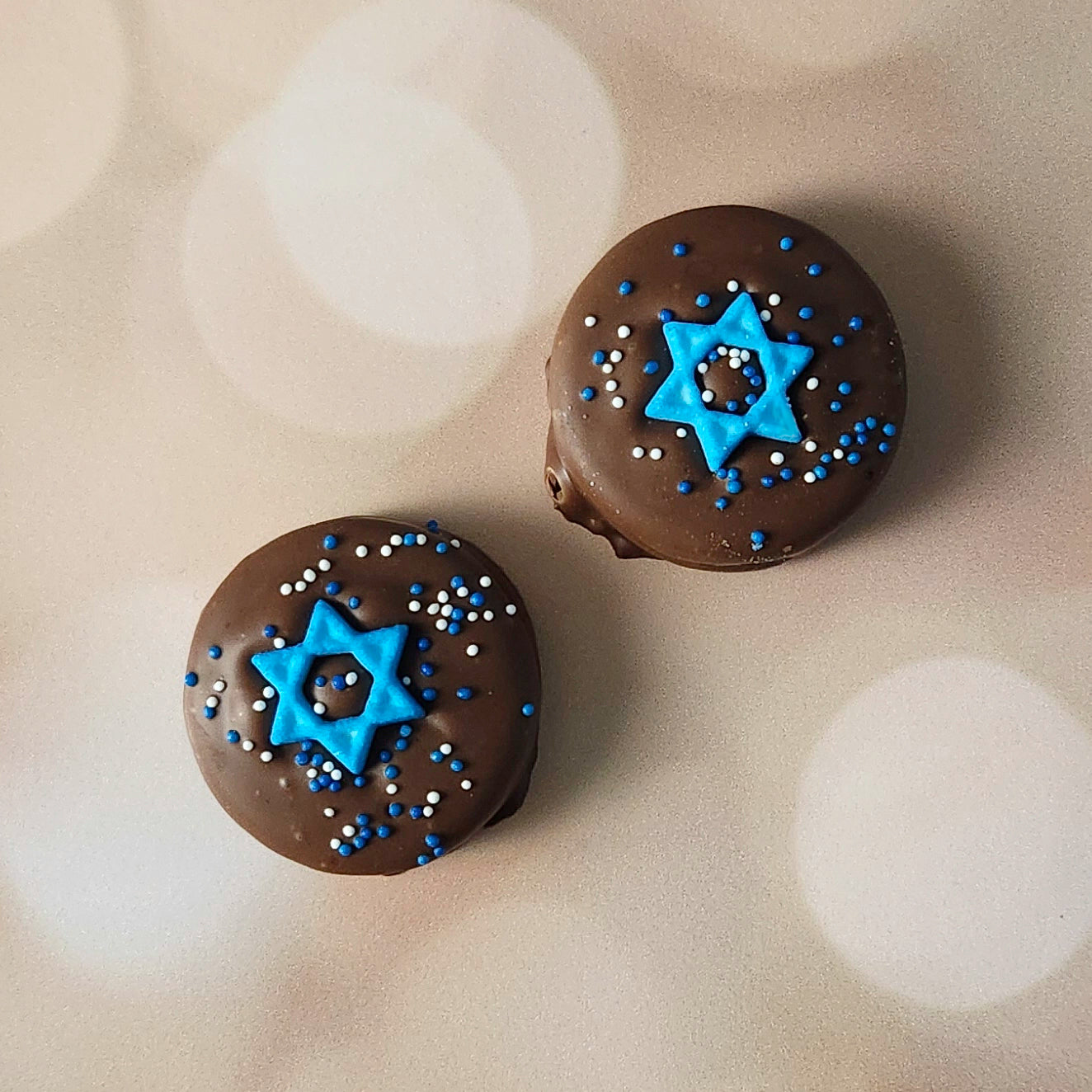 Celebrate Hanukkah with a delicious twist on a classic favorite! Our Hanukkah Themed Milk Chocolate Covered Oreos are dipped in creamy milk chocolate and decorated with festive holiday designs to honor the season. Packaged in a convenient two-pack, these treats are perfect for sharing, gifting, or savoring during your Hanukkah celebrations