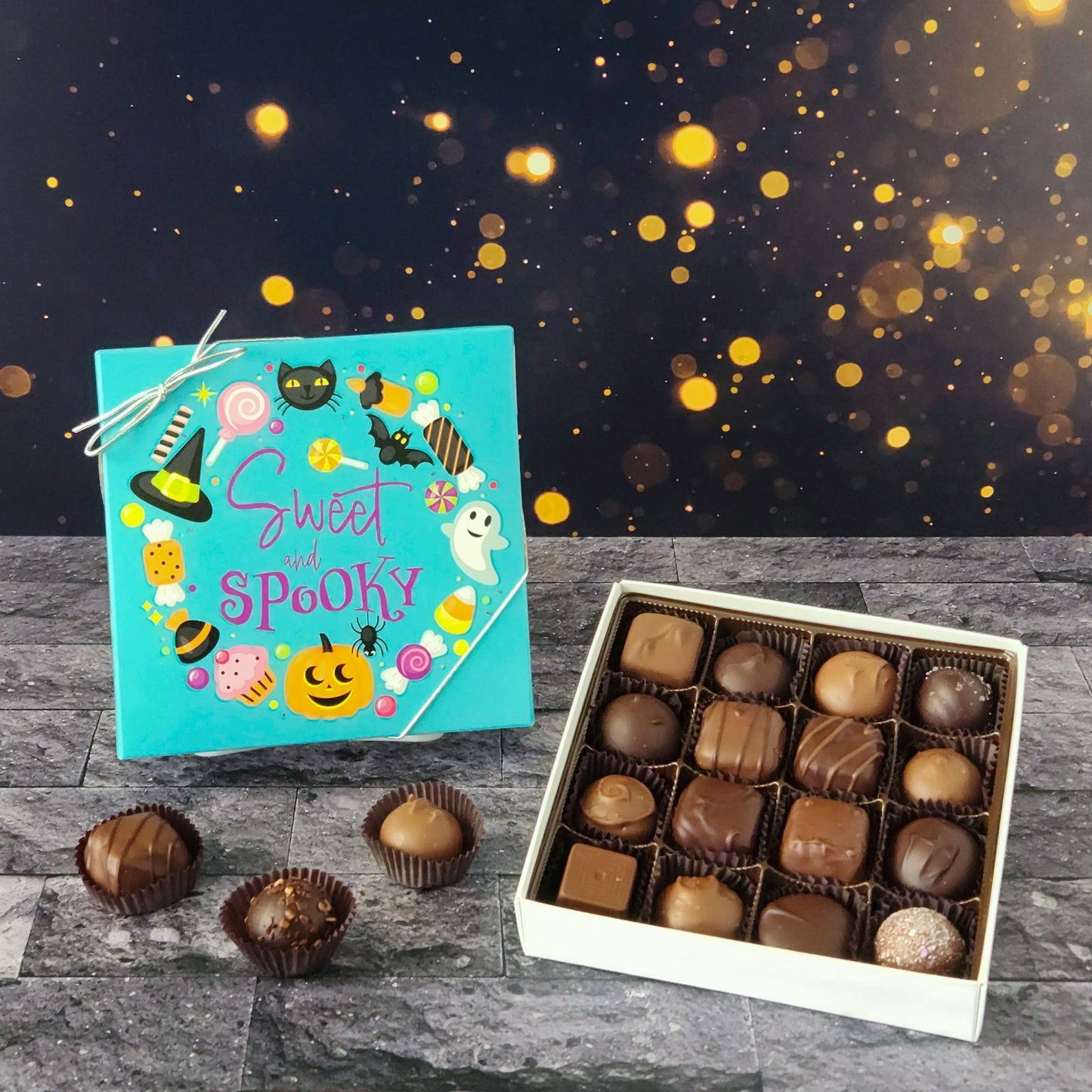 This Sweet and Spooky Assortment Box is a collection of our popular handmade chocolates. Available in 9-piece or 16-piece boxes, this assortment features a mix of milk and dark chocolate truffles, creams, caramels, and meltaways.