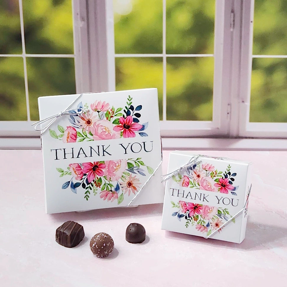 Floral 'Thank You' boxes with chocolates on a windowsill