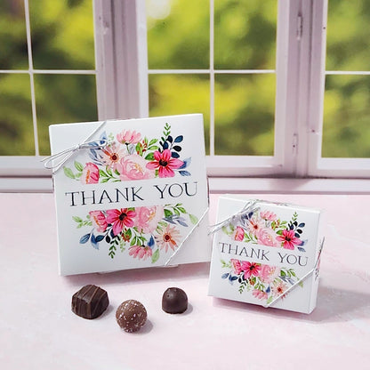 Floral 'Thank You' boxes with chocolates on a windowsill