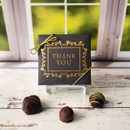 An assortment of our most popular milk and dark chocolate creams, caramels, melt-aways, and truffles all packed into a Thank You themed box.