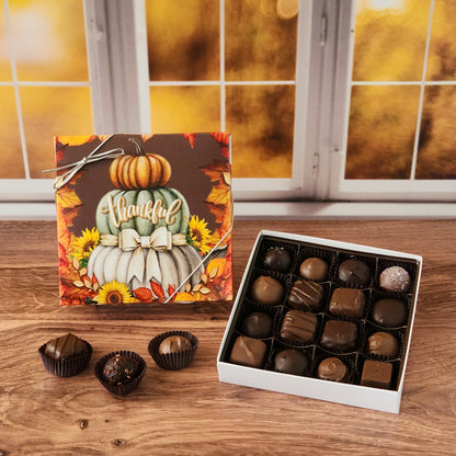 Celebrate the sweetness of the season with our Thankful Fall Chocolate Assortment!  Available in a 9-piece or 16-piece box, this collection is filled with rich milk and dark chocolates, crafted in small batches right here in our candy kitchen.  Each bite is a surprise of flavor and texture, featuring silky creams, gooey caramels, melt-in-your-mouth meltaways, and decadent truffles that capture everything we love about fall.